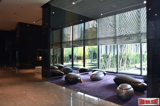 Rhythm Sukhumvit 36 | Comfortable One Bedroom Thong Lo Condo for Rent with City & Pool Views